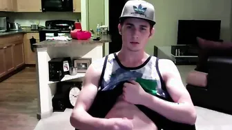 Slim twink jerks off on webcam in his apartment