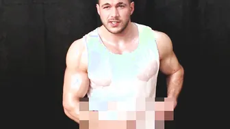 Sweaty oiled muscle hunk jerks off and cums