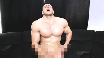 Muscular hunk gives himself a slow sensual handjob