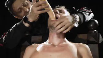 Bound sub in leather deepthroats dildo on stool before anal group fuck