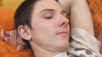 Solo twink strokes his huge uncut cock