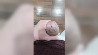Solo twink stands and jerks his big uncut cock to cumshot