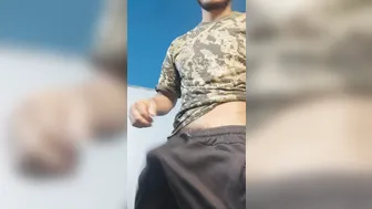 Muscular army hunk strokes his thick uncut cock and shoots a creamy...